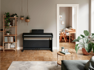 The Yamaha Arius YDP-145 in a home setting with modern decor design